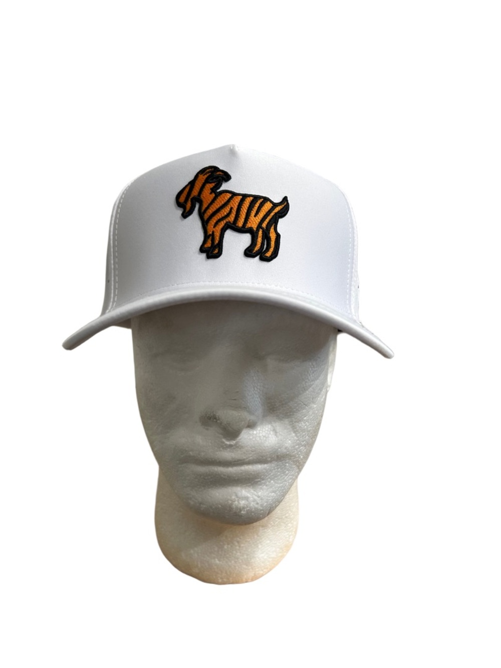 White Trucker Hat with Orange Striped Goat Patch